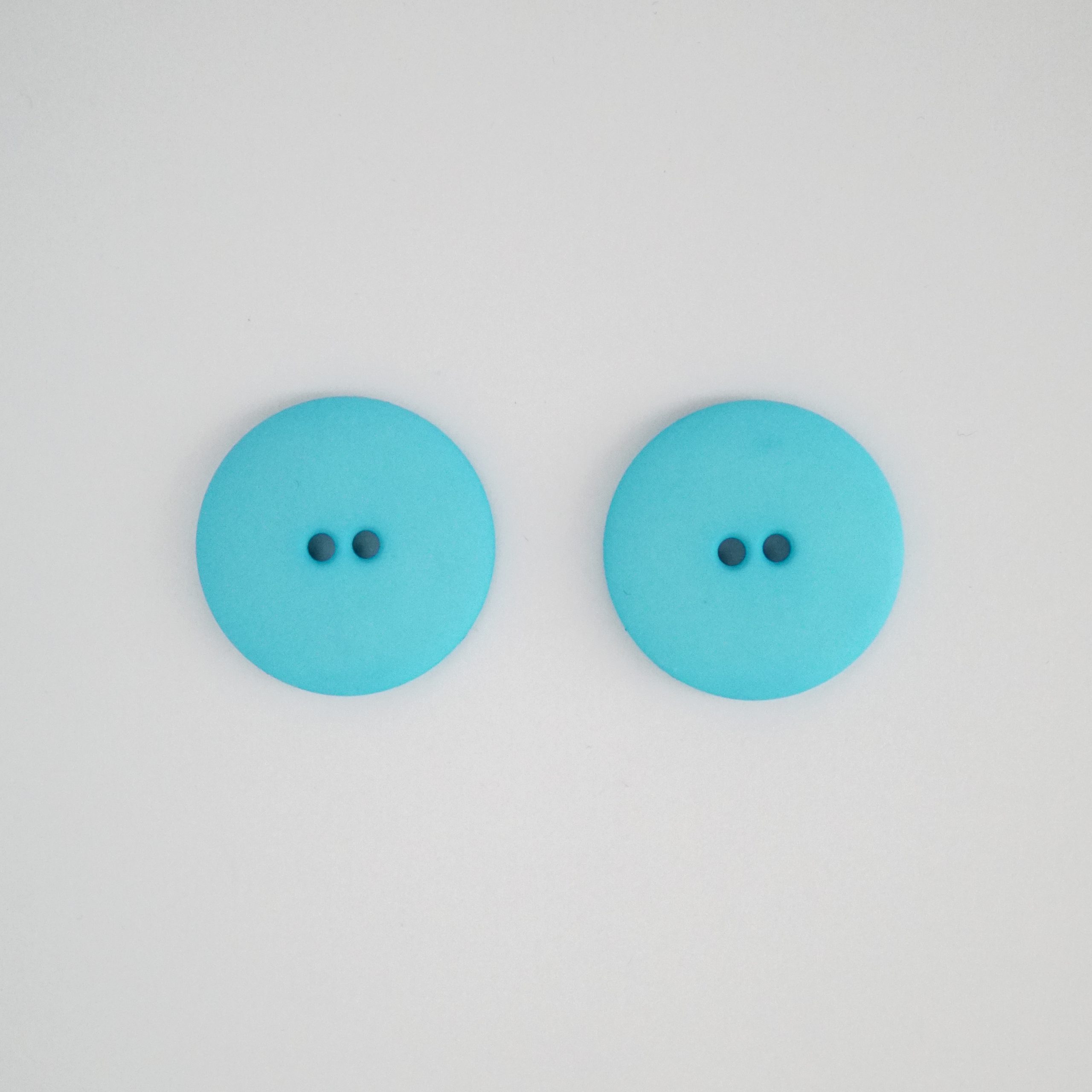 mint blue plastic buttons