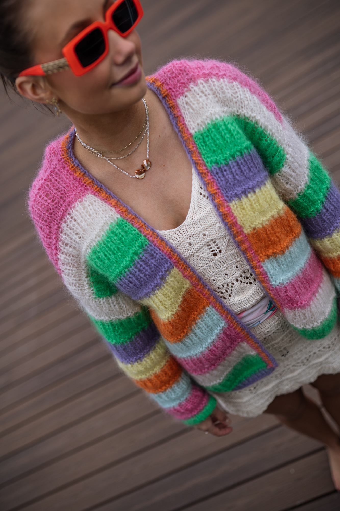 Striped colorful knit for women. Yarn and knitting pattern