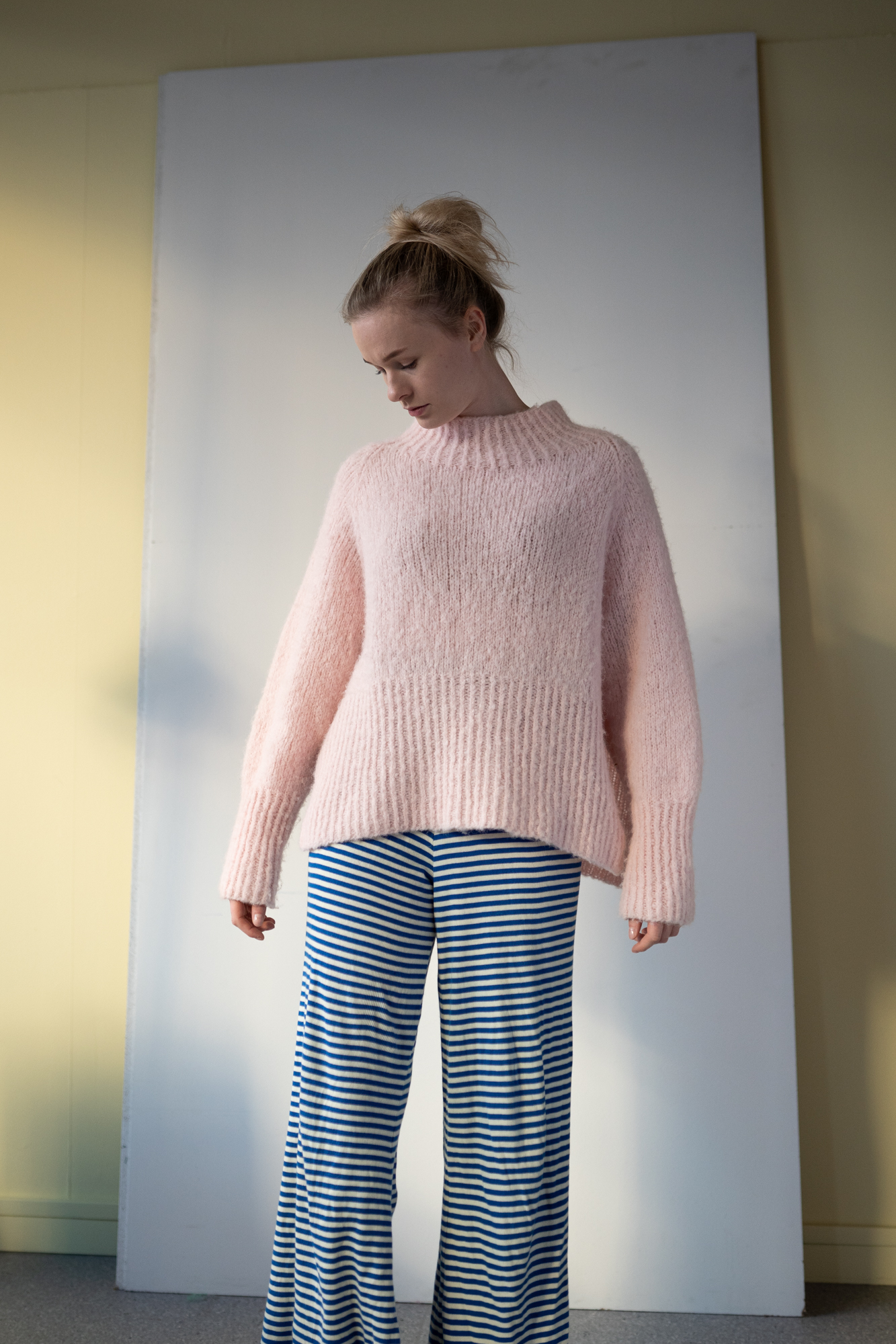 Knitted sweater with split