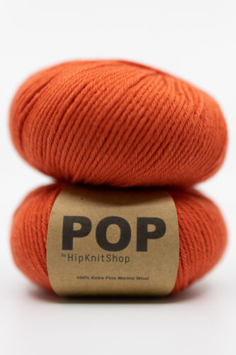Merino yarn red orange color. Soft merino colorful yarn