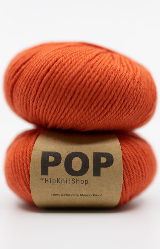 Merino yarn red orange color. Soft merino colorful yarn