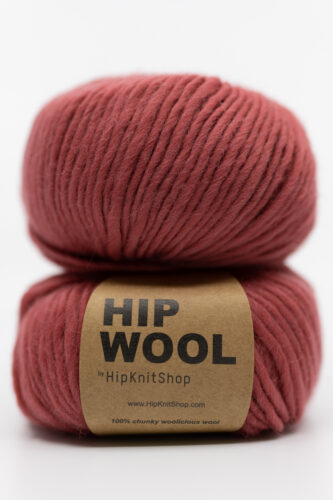 yarn in a muted red shade. Pure wool yarn online store yarn and knitting inspiration knitting project