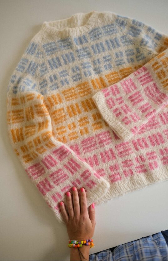 knitted sweater women pattern. Colorful raglan sweater in brushed alpaca knottong pattern and yarn