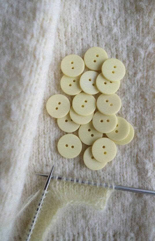 Light yellow buttons, pastel yellow buttons, yellow plastic buttons, buttons for knitted jacket, cardigan buttons, knitting buttons, two hole buttons, buttons for sweater, soft yellow buttons, cute knitwear buttons.