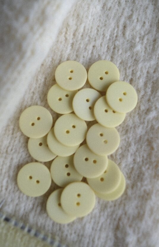 Light yellow buttons, pastel yellow buttons, yellow plastic buttons, buttons for knitted jacket, cardigan buttons, knitting buttons, two hole buttons, buttons for sweater, soft yellow buttons, cute knitwear buttons.