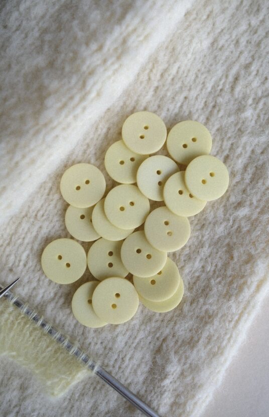 Light yellow buttons, pastel yellow buttons, yellow plastic buttons, buttons for knitted jacket, cardigan buttons, knitting buttons, two hole buttons, buttons for sweater, soft yellow buttons, cute knitwear buttons.