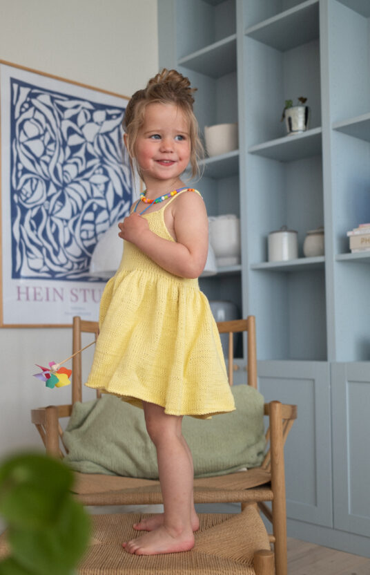 Milla Summer Dress for Children Knitting Pattern - HipKnitShop Knitting pattern for children's dress. Knitted dress for children. Summer knitting inspiration for kids. Girls' knitted dress in cotton. Knitting pattern summer dress cotton for girls. Kids knitted dress inspiration
