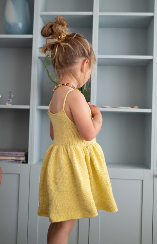 Milla Summer Dress for Children Knitting Pattern - HipKnitShop Knitting pattern for children's dress. Knitted dress for children. Summer knitting inspiration for kids. Girls' knitted dress in cotton. Knitting pattern summer dress cotton for girls. Kids knitted dress inspiration