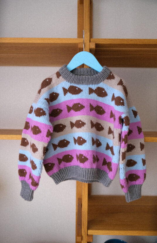 Knit a children's sweater, fisherman-style knitting pattern. Knit in merino wool. Knit in non-itchy yarn. Children's sweater knitting pattern. Knitting pattern sweaters kids. Fisherman sweater, fish. Fishy sweater merino knit pattern for boys and girls.